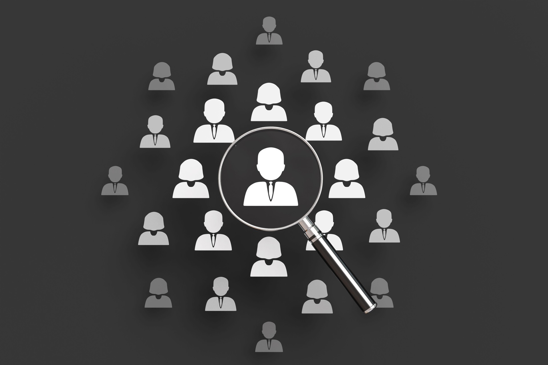 Magnifying glass enlarging a paper cut white human head among a group of female and male icons on black background. Illustration of the concept of hiring the right person in business